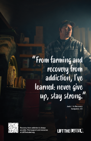 Man standing in front of a tractor. Image text reads, “From farming and recovery from addiction, I’ve learned: never give up, stay strong.”